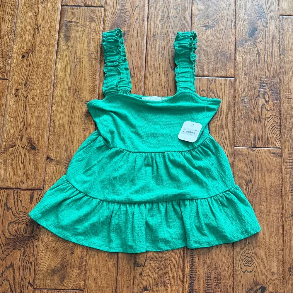 Sleeveless Ruffled Top - Picture 1 of 3